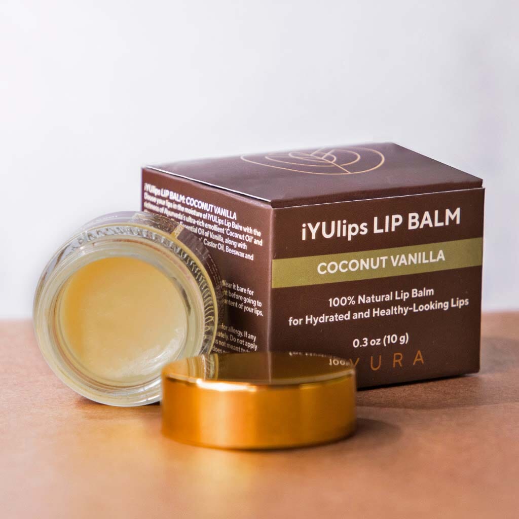 iYUlips Coconut Vanilla: Luscious Lip Balm container with packaging on a table top