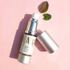 Tulsi Mint Tonifying Eye Gel with a pink background